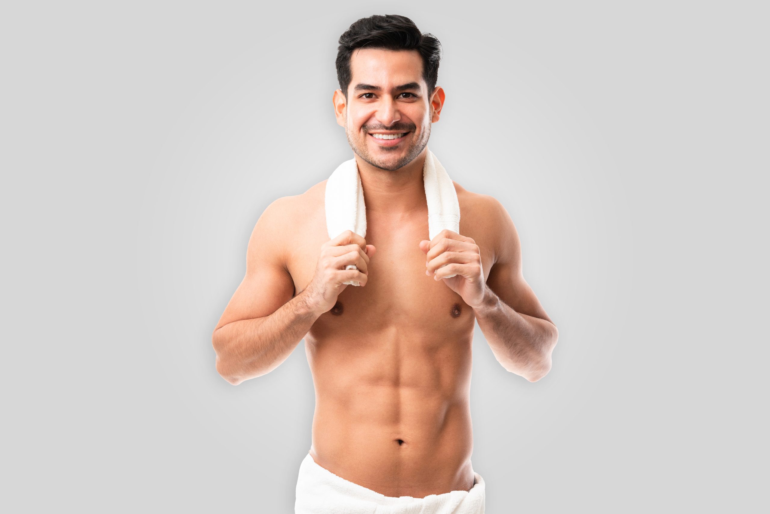 Good looking latin man in towel